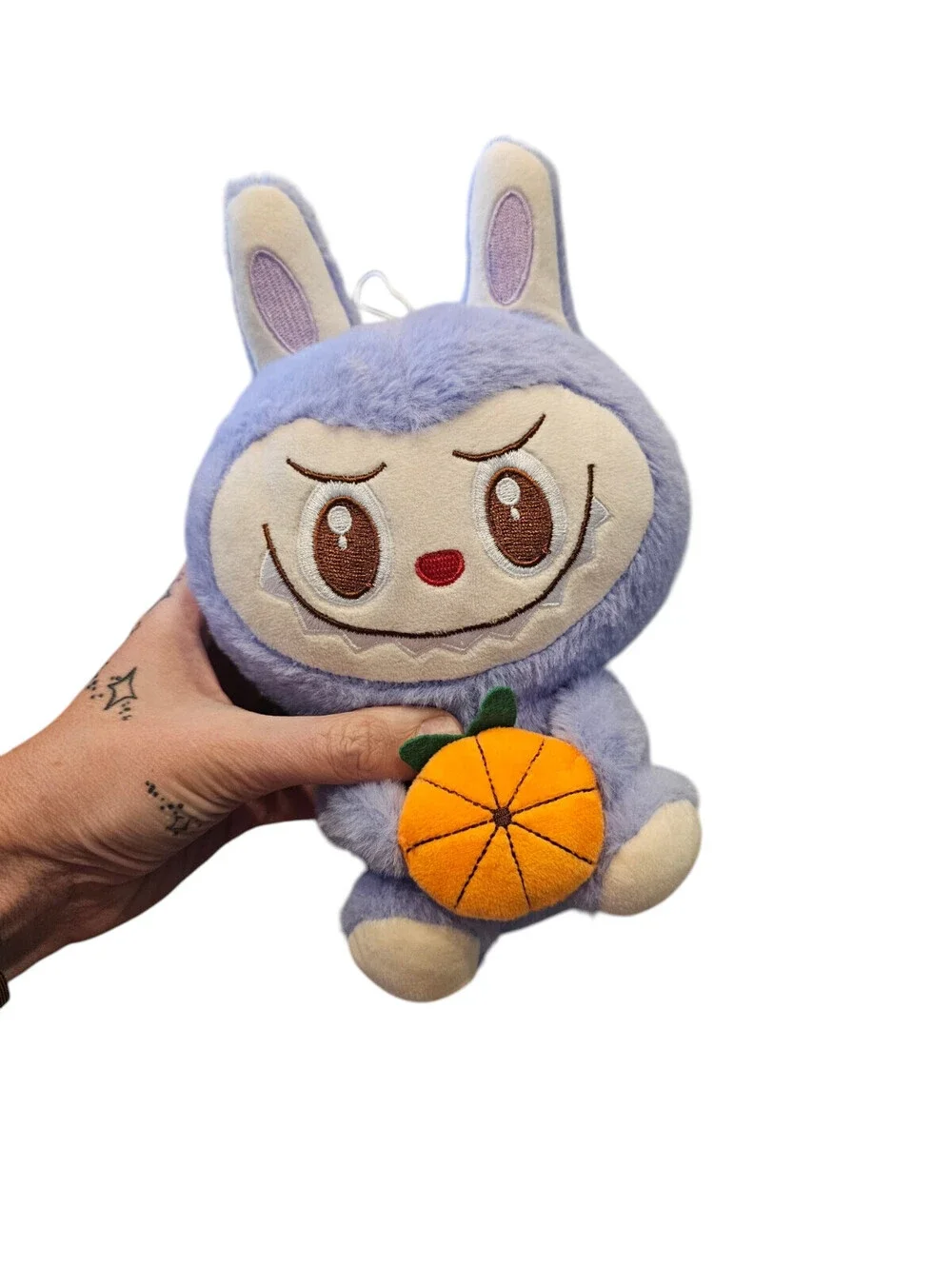 Labubu Plush Stuffed Animal Purple Holding Orange